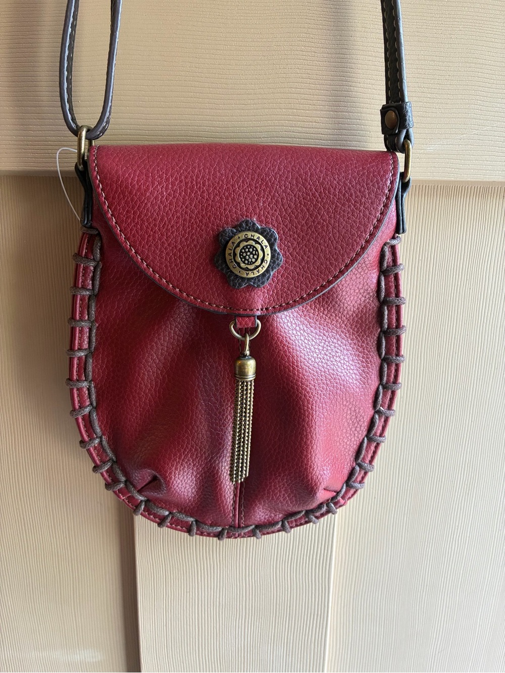 Chala Crossbody Purse with Tassel and Whipstitch Detail Deep Red Vegan Leather
